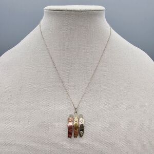 Elegant Gold and Silver Pendant Necklace